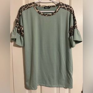 Heimish Light Teal animal print bell sleeves, no size tag, appx size M/L
